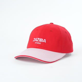 Red and pink cap with 'Zaziba Studio' logo on a white background