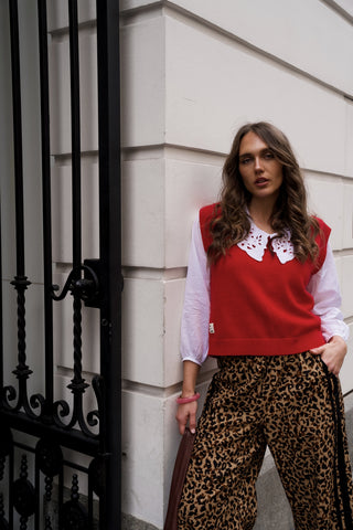 Vogue leopard print Jaya Linen Pant worn with red knitted vest 