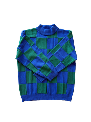 Blue and green checkered sweater on a white background
