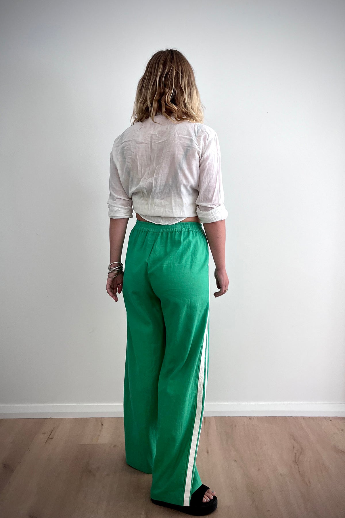 Jaya linen pant by zaziba studio green with white stripes down side