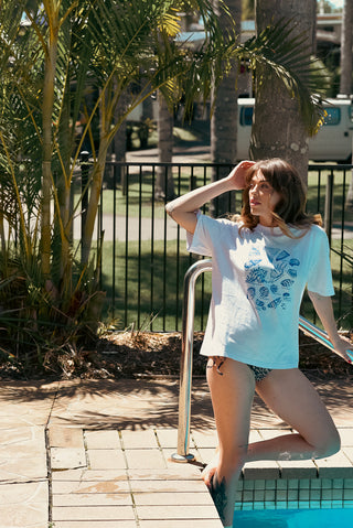 White tshirt with hand drawn seashells print