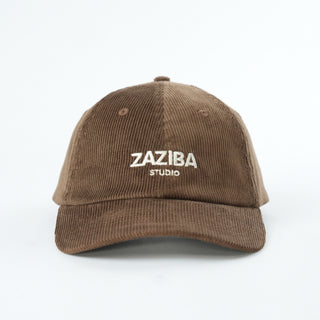 Brown cap with 'Zaziba Studio' logo on a white background